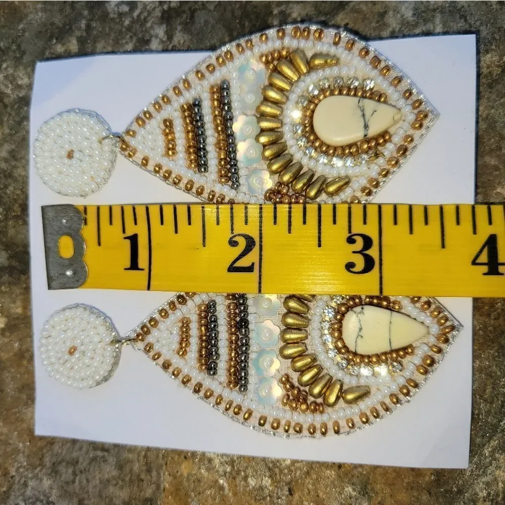 White Seed Beaded Fish Eyed Earrings in Goldtone
